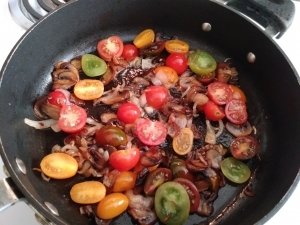 Add tomatoes to the pan