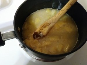 Add water and bismati rice to pineapple and butter